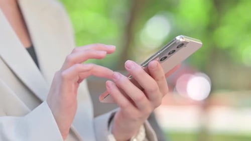 Close Up of Businesswoman Using Smartphone, Outdoor