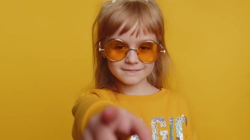 Child Girl Kid Smiling Excitedly and Pointing Finger to Camera Choosing Lucky Winner Indicating