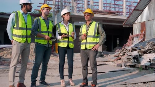 Construction Team Meeting on Building Site