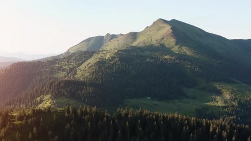Flying up in the sky. Majestic Carpathian Mountains. Beautiful landscape of untouched nature