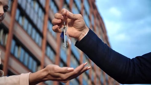 Woman Buying Flat Residential Apartment City House Man Real Estate Agent Giving Keys Outdoor Slowmo