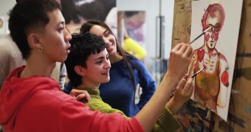 Multiracial Students Painting Together Inside Art Classroom at University African
