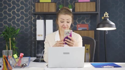 Woman Having Video Call in Office