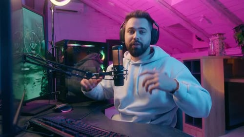 Man Recording Video Podcast at Home Studio