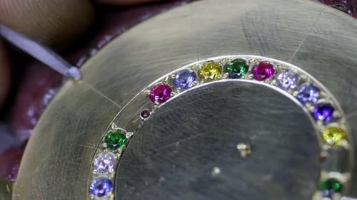 Hand Engraving Lines Into a Golden Pendant Fitted with Colorful Cristals Workshop