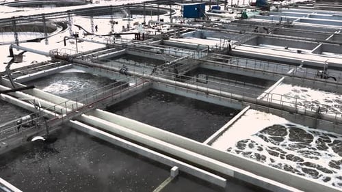 Pouring of Sewage Water Into Huge Basin at Treatment Plant