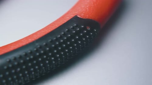 Close-Up of Metal Cutting Pliers on White Surface