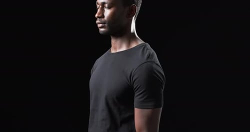 Man with Black Hair Posing in Studio