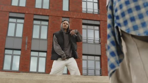 Young Man Dancing in Urban Environment