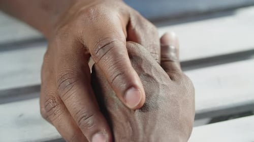 Hands Interlocked in Loving Connection and Support