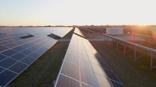 Close Up Drone View of Solar Panels Stand in a Row in the Fields Power Ecology Innovation Nature