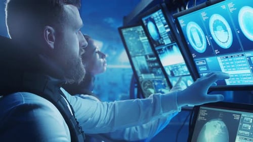 Team of Astronauts in a Space Suits Aboard the Orbital Station A Crew of Cosmonauts Piloting the