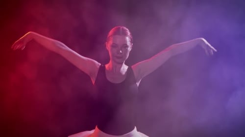 Professional Ballet Dancer Performing Spin in Dance Hall Medium Portrait Shot Dramatic Smoke and