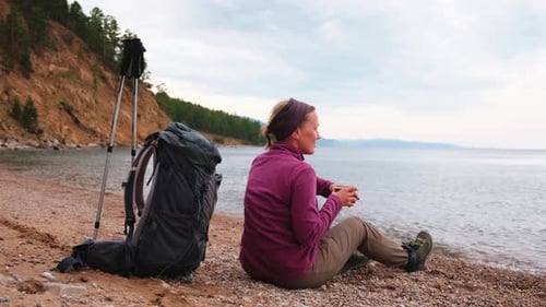 Hiking Tourism Adventure Backpacker Woman Resting After Hiking Looking at Beautiful View Hiker Girl