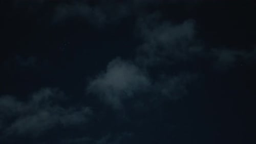 Night Sky with Clouds and Stars