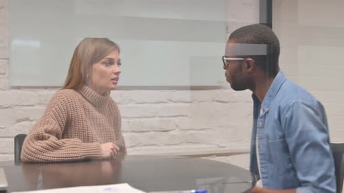 Creative Young Colleagues Doing Argument in Office