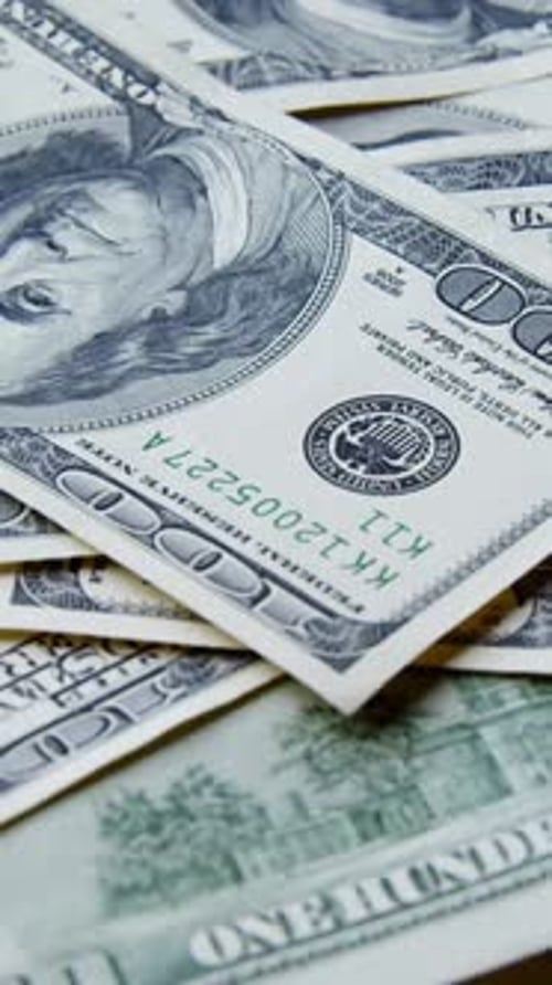 One Hundred Dollar Bills Panning Shot Portrait Orientation
