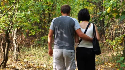 Couple Walking Along Path at Summer Forest Happy Pair Going Along Trail at Wild Woodland Lovers