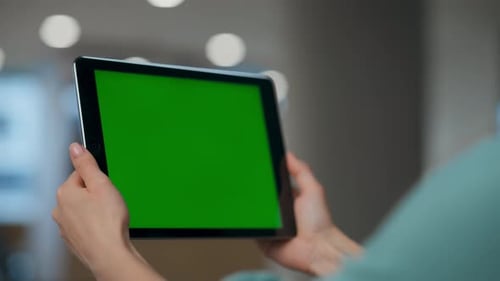 Ceo woman speaking at workplace watching green screen computer in modern office