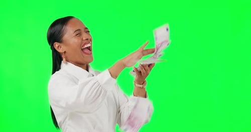 Success, cash and happy with business woman on green screen for winner, lottery and bonus