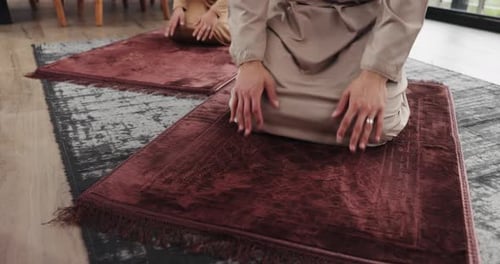 Prayer, couple and home with hands for muslim religion, worship and praise to God with mindfulness