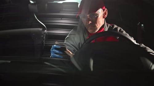Worker Detailing Car Interior