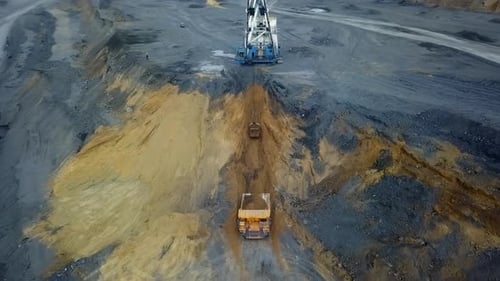 Heavy Machinery is Engaged in Digging Operations at the Construction Site Including Excavation Stock