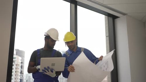 Engineers are working at tower.