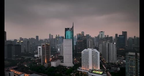 Jakarta downtown buildings at sunset.