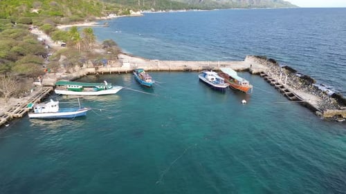 aerial view of fishing boats docked in the harbor