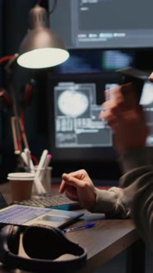 Vertical Video Male Developer Answering Phone Call in Office