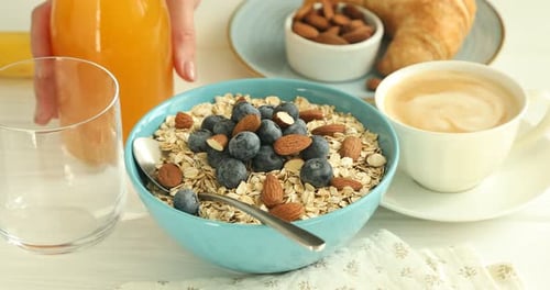 Healthy Breakfast: Oatmeal, Blueberries, Almonds, Orange Juice