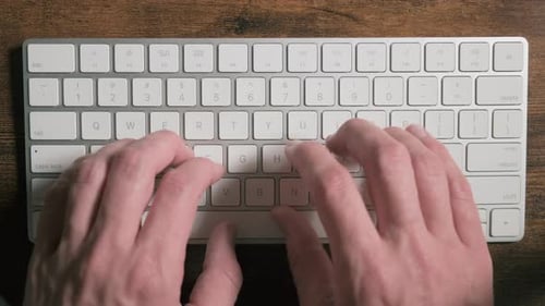 Male Fingers Pressing Buttons,Typing Text On bluetooth Keyboard,close up
