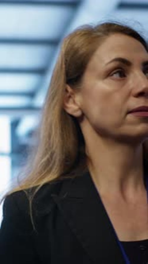 Woman Standing Inside Corporate Office