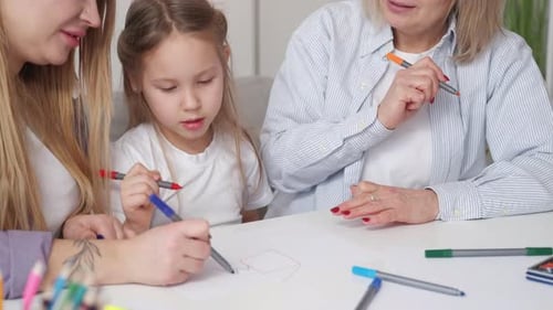 Three Generations Drawing Together at Home