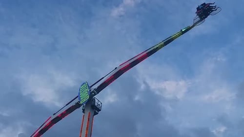 Spinning Booster Carousel In The Evening
