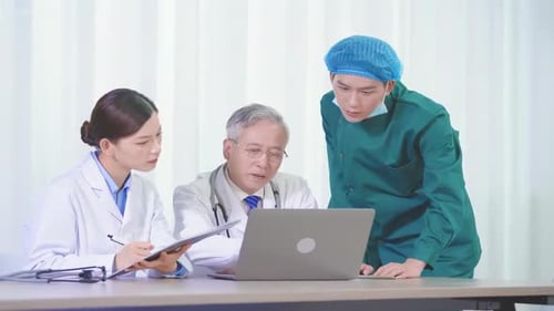 Teamwork and group of doctors nurses in discussion in the hospital boardroom for treatment plan