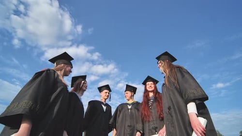 Team of College or University Students Celebrating Graduation Group of Happy Successful Graduates in