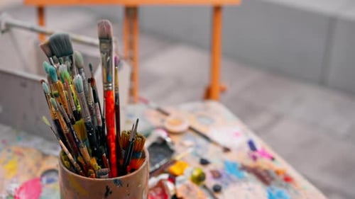 Close-up of a brush stand standing in a painting studio concept of love for fine art and painting