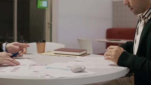 Man Signing Document