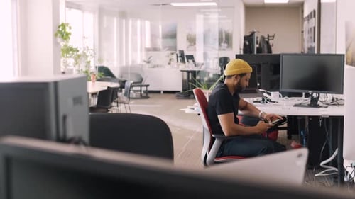 Creative Businessman Using Smart Phone in Open Plan Office 4044 Years