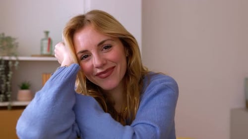 Smiling Woman with Blonde Hair in Natural Light