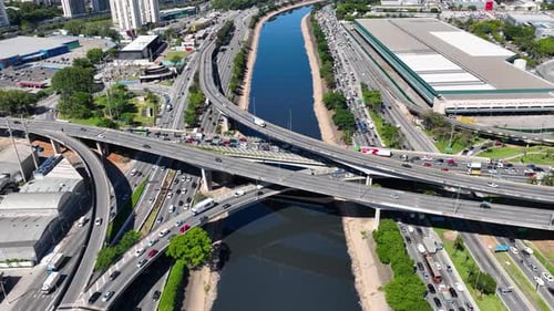 Cityscape of rush traffic jam at freeway road. Transportation scenery.