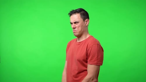Man Looking at the Camera Suspiciously and Surprised