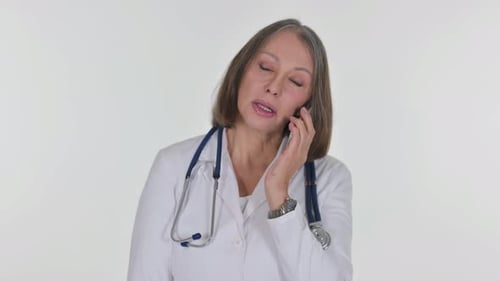 Woman Doctor Talking on Phone