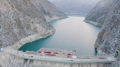 Hydroelectric power station surrounded with mountains