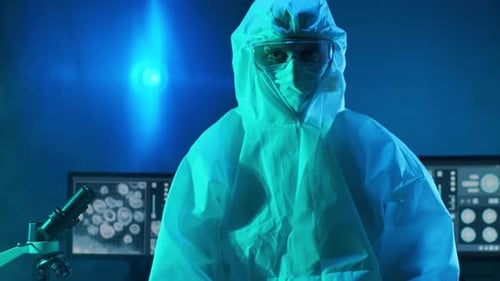 Adult in Hazmat Suit in a Laboratory