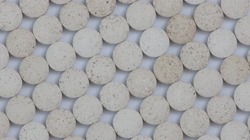 Close-Up of Gray Round Textured Objects