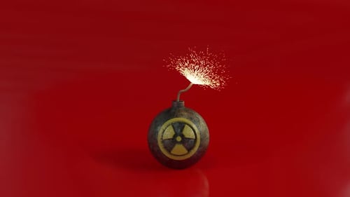 Tickende Zeitbombe mit radioaktivem Symbol vor einem leuchtend roten Hintergrund