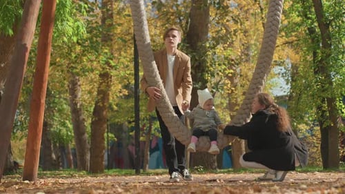 Nurturing Family Connections Depicted Amid Autumn Park Scenery Scene of Caring Family Relationships